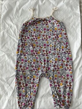 Girls Floral Knit One-Piece Romper with pockets and easy snaps for changing